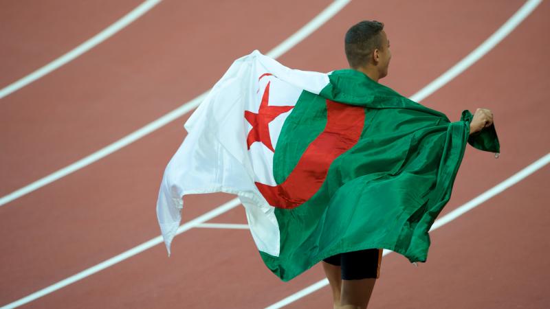 Algerian Athlete celebrating victory Algerian Athlete celebrating victory