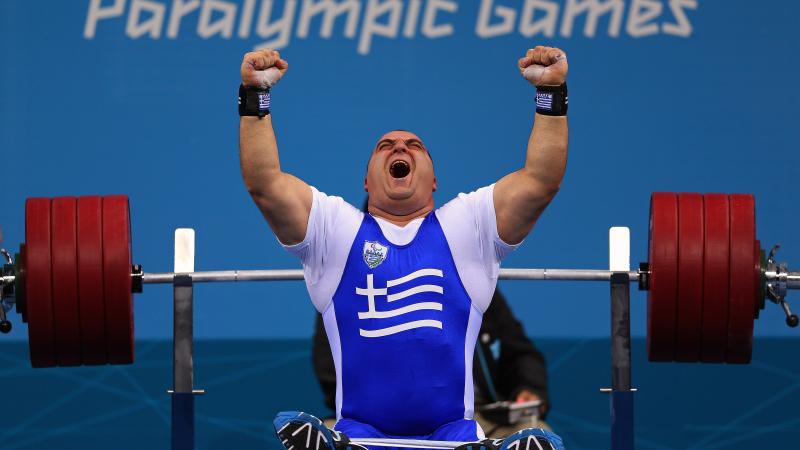 Pavlos Mamalos of Greece Pavlos Mamalos of Greece reacts with intense joy as he competes in the Men's -90 kg Powerlifting event.