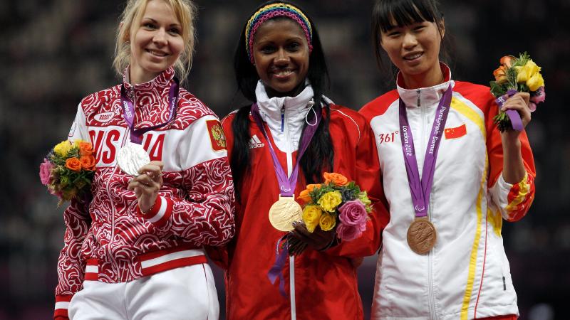 Yunidis Castillo A picture of women on a podium with medals around their neck