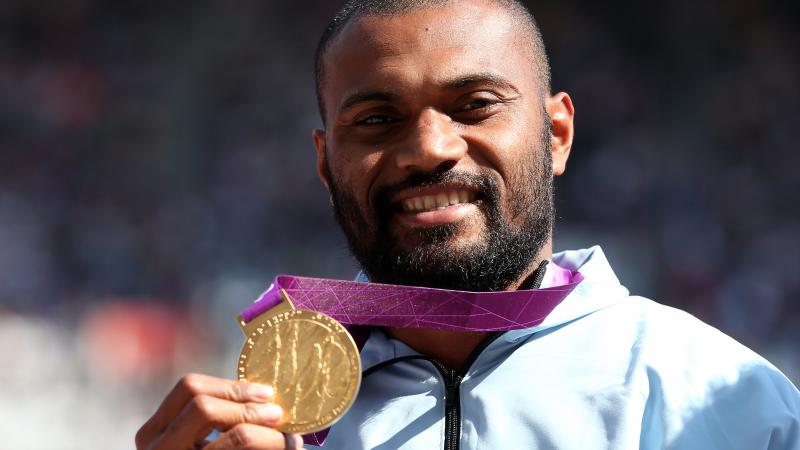 Iliesa Delana A picture of a man with a medal around his neck