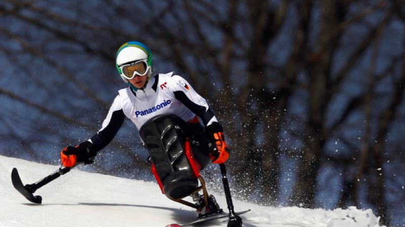 Anna Schaffelhuber Sochi Athlete practicing alpine skiing in a sit-ski.