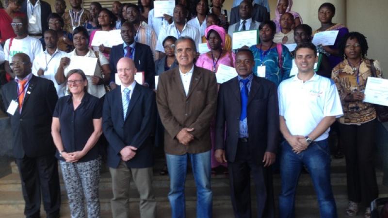 Inas Agitos Foundation workshop in Africa A group of about 40 people pose for a photo after a workshop.
