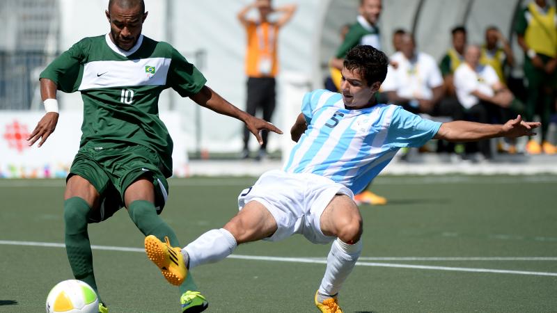 Brazil's Jan Brito Da Costa and Argentina's Matias Bassi - Football 7 Two men playing football