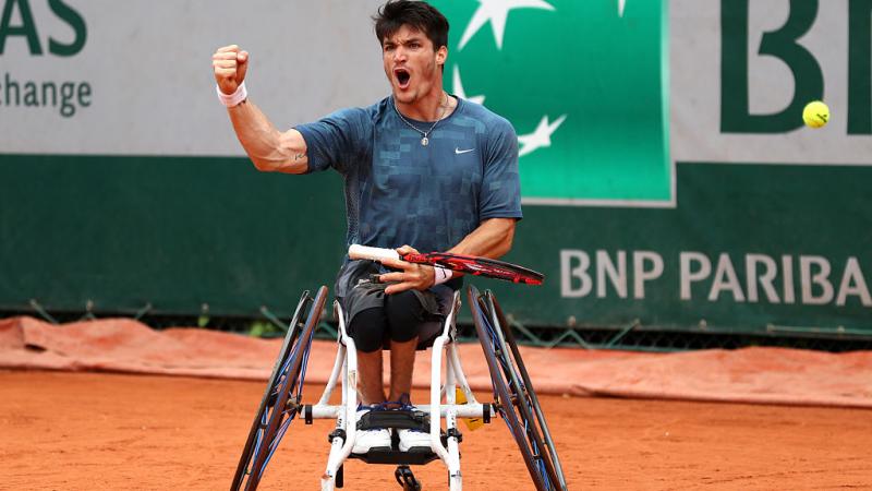 Gustavo Fernandez - Argentina - 2016 French Open Man in wheelchair on tennis court, celebrating