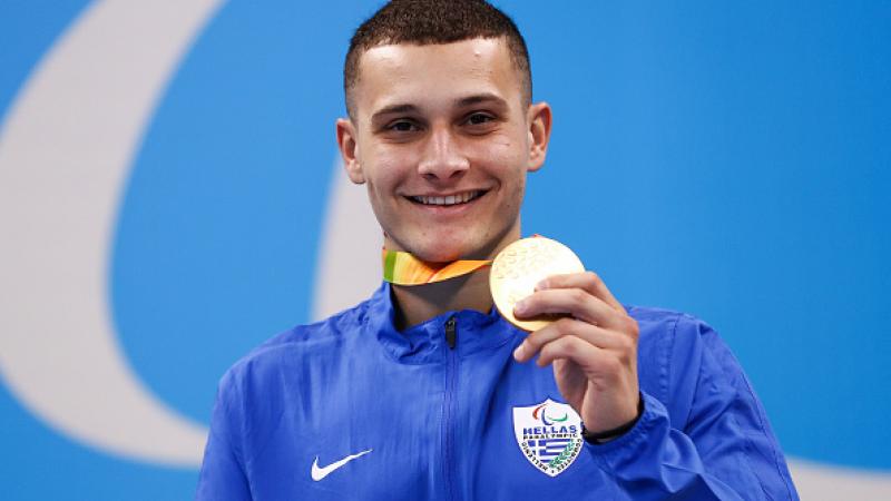 Dimosthenis Michalentzakis - Greece - Swimming Man on podium showing his medal