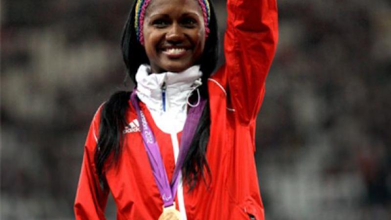 Yunidis Castillo A picture of a woman showing her gold medal