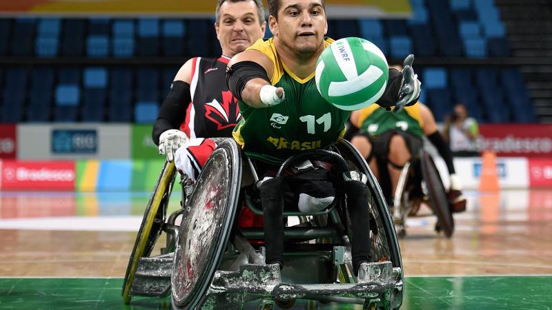 Julio Braz - wheelchair rugby A wheelchair rugby player chasing for the ball