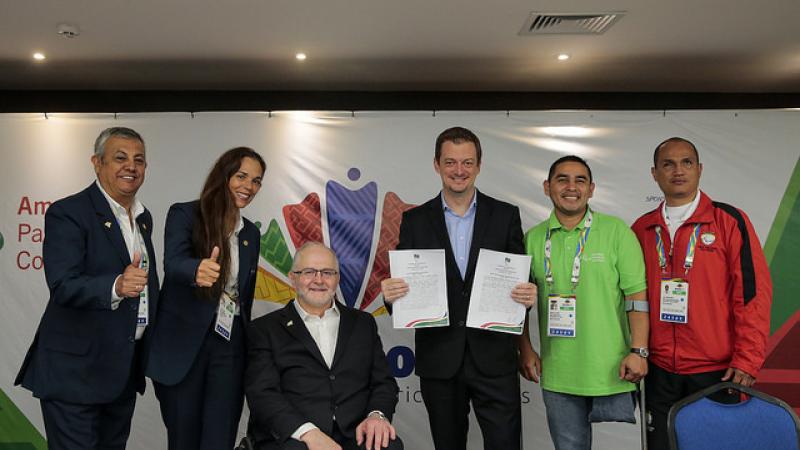 Andrew Parsons, Sir Philip Craven with CPB, NPCs Ecuador, Chile and Peru People pose for photo after a partnership agreement is signed