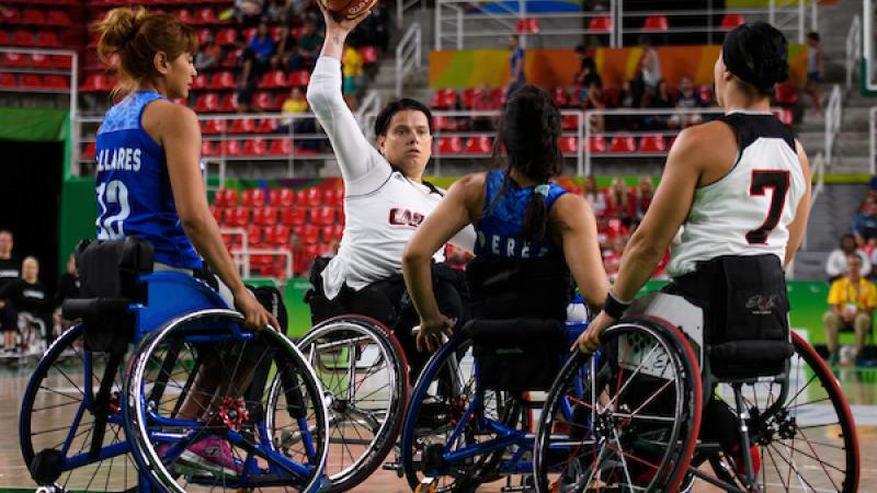 Canada wheelchair basketball Woman shooting a basketball