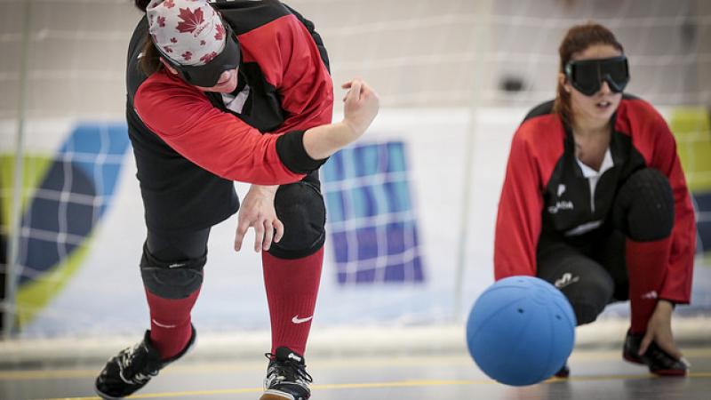 Goalball - Canada Woman goalball player rolls a ball
