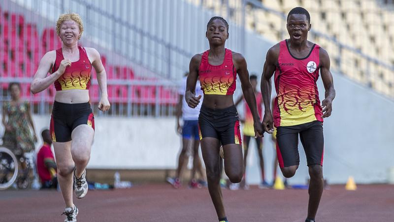 Angola - Agitos Workshop Three athletes running on a track
