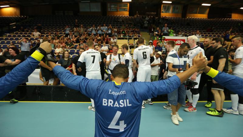 Brazil beat Germany - Goalball World Championships Brazilian goalball player raises arms after winning