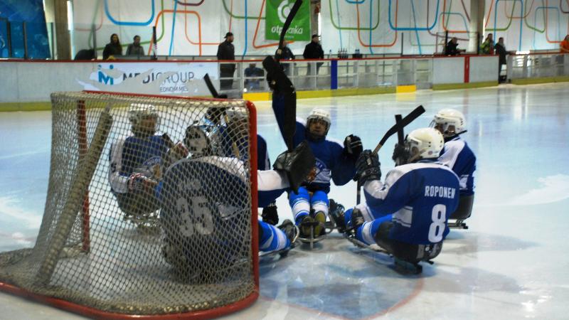 Finland - Para ice hockey - World Champs C-Pool Finland's Para ice hockey team huddle in front of their goal