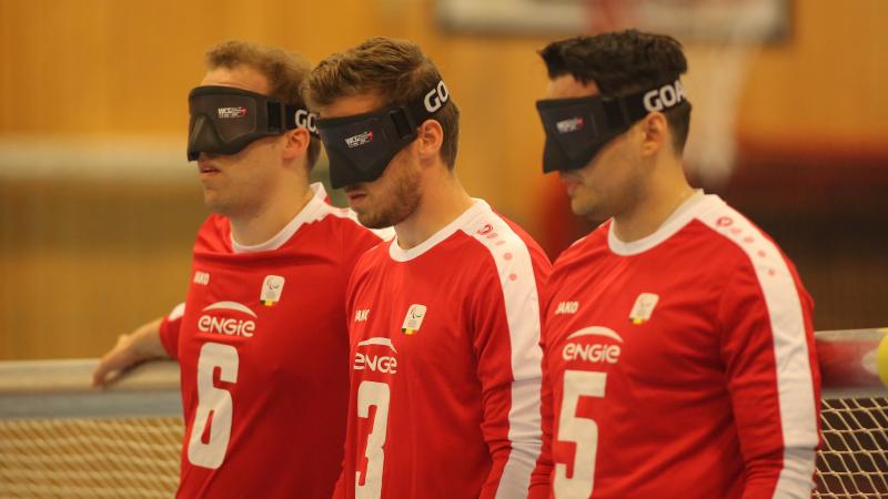 Belgium goalball - Malmo 2018 three Belgian male goalball players lined up in a row