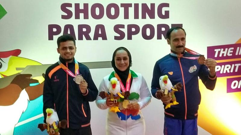 Manish Narwal - India Narwal, on the left, at the Indonesia 2018 Asian Para Games