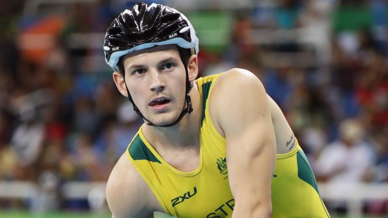 Rheed McCracken - Australia - athletics Rheed McCracken looks to the front after a race while wearing his Australian gear and helmet after the race
