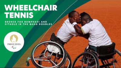 Donald Ramphadi and Lucas Sithole celebrate after winning South Africa's first Paralympic wheelchair tennis medal