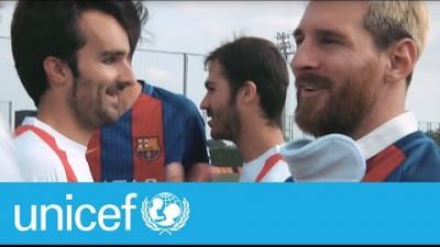 Video Thumbnail of Leo Messi greeting a blind football athlete with the Unicef banner across the bottom.