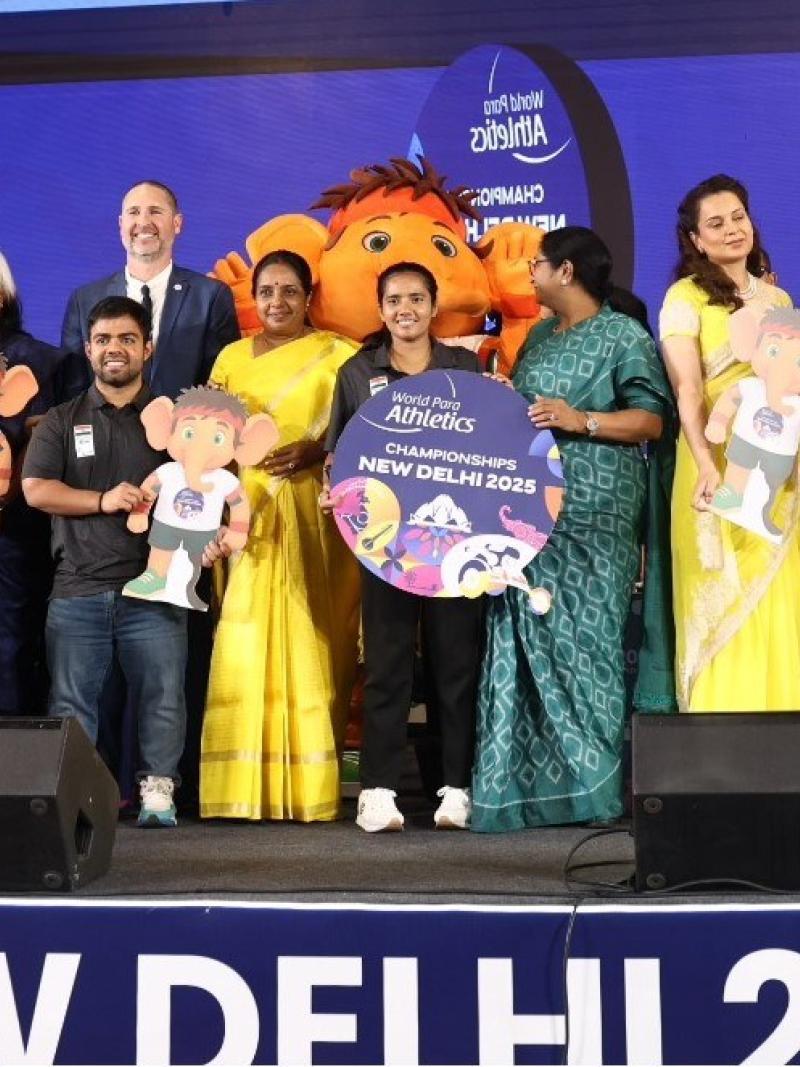A group of people on a stage to promote the New Delhi 2025 World Para Athletics Championships