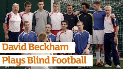 Video Thumbnail of David Beckham alongside blind football athletes and with text "David Beckham Plays blind football".